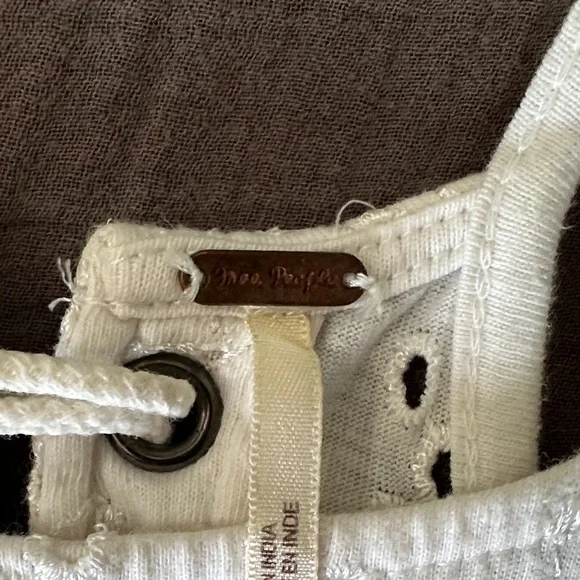 Free People Women’s Small White Eyelet Top Raw Hem Lace Up Back Embroidered Boho - Picture 2 of 12